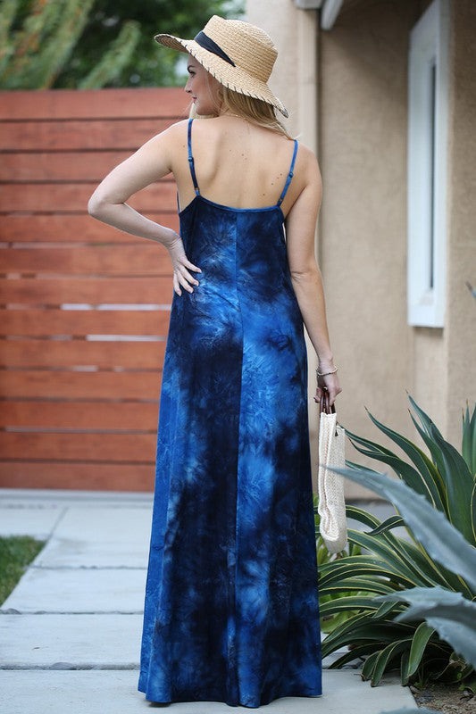 Look beautiful and stay comfortable with the Spaghetti Strap Maxi Long Dress with Pocket. This dress features soft fabric and a convenient pocket, ideal for days when you need to run errands without taking a bag. Perfect for any occasion, you'll stay stylish and comfortable all day long.