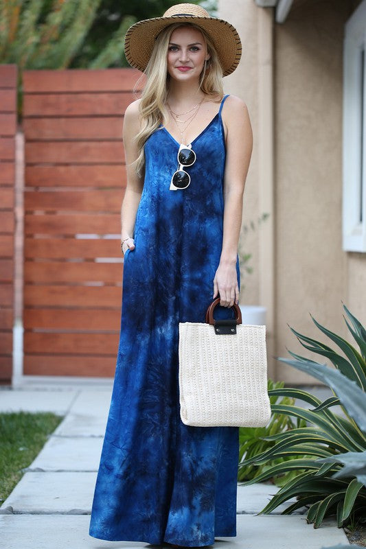Look beautiful and stay comfortable with the Spaghetti Strap Maxi Long Dress with Pocket. This dress features soft fabric and a convenient pocket, ideal for days when you need to run errands without taking a bag. Perfect for any occasion, you'll stay stylish and comfortable all day long.