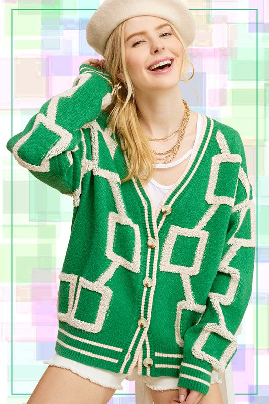 Introducing the Reina Cardigan, your go-to piece for effortless style. This slouchy and slightly oversized knit cardigan offers the perfect blend of comfort and fashion. With its drop shoulders design and soft, cozy fabrication, it's the ultimate throw-on-and-go essential. Embrace an easy and relaxed look while staying chic and comfortable with the Reina Cardigan.