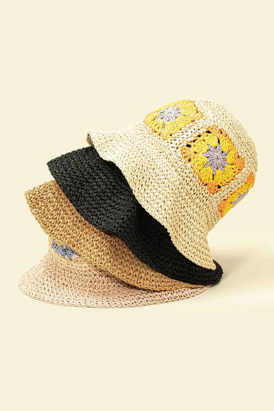 This artfully crafted bucket hat has a definite, vintage wow factor. created entirely of hand-crocheted paper. It has flower patterns on the top part of the hat.  Made of 100% straw. Size adjuster inside. Can be folded very small to fit in your purse.