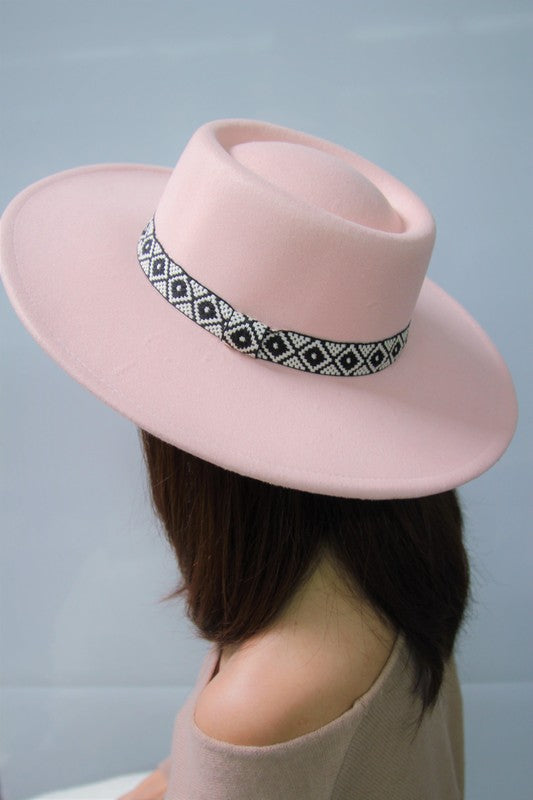 - Boho band - Suede - Flat top - Embroidered band - Trendy Fedora hat - Sun cover - Spring fashion fedora - Approximate measurements: height 3.5", brim 3.5" - Approximate circumference: 24", 47.5"  Style: casual  Material Composition: - 100% Polyester, pink