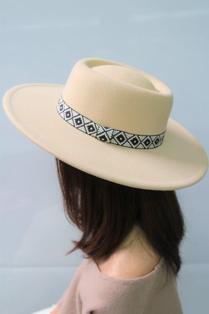 - Boho band - Suede - Flat top - Embroidered band - Trendy Fedora hat - Sun cover - Spring fashion fedora - Approximate measurements: height 3.5", brim 3.5" - Approximate circumference: 24", 47.5"  Style: casual  Material Composition: - 100% Polyester, cream, beige, ivory