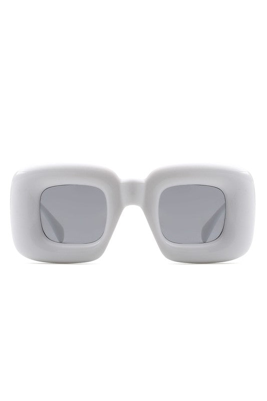 These Square Irregular Chic Chunky Fashion Sunglasses are sure to update your look this season. Sleek and stylish, they provide protection and shade from the sun's harsh rays. Their innovative design is perfect for adding a fashionable touch to any ensemble. white shades for an all white party 