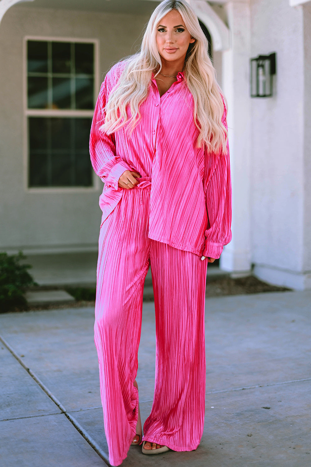 Pink pleated button up shirt and wide leg pants. Chic, casual, AKA, vacation, resort wear. Brunch, work. 