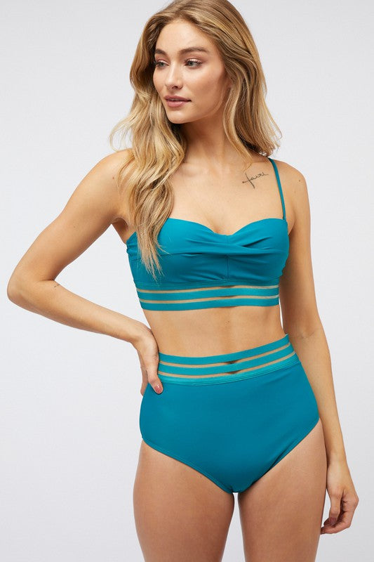 This SOLID TWO PIECE SWIMSUIT is perfect for a day of fun in the sun. Its two-piece design gives you superior comfort and flexibility when swimming or playing beach volleyball. The lightweight material is quick-drying.. teal