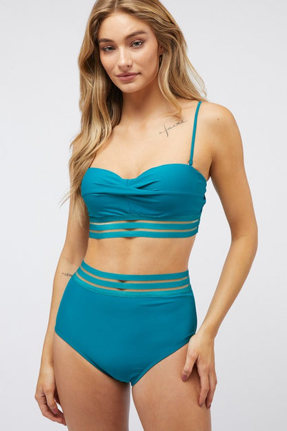 This SOLID TWO PIECE SWIMSUIT is perfect for a day of fun in the sun. Its two-piece design gives you superior comfort and flexibility when swimming or playing beach volleyball. The lightweight material is quick-drying. teal