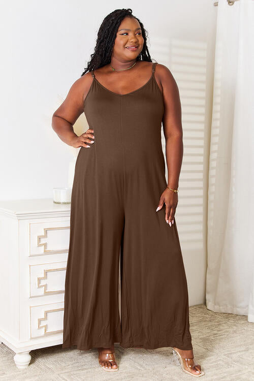 brown, plus size , This spaghetti strap tied wide-leg jumpsuit is a modern and trendy choice for any occasion. Its wide-leg design and spaghetti straps create a flattering silhouette, while the tied detail adds a touch of elegance. This jumpsuit is chic and comfortable, perfect for a night out or a summer event