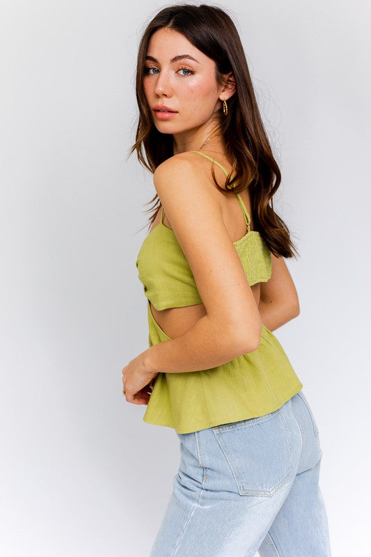 lite green, ur cutout spaghetti top is the perfect addition to your summer wardrobe. Made from a lightweight and breathable fabric, this top is designed to keep you feeling cool and comfortable, even on the hottest days.  Featuring a sleek and modern cutout design, this spaghetti top is sure to turn heads. The cutout detail on the back adds a touch of sexiness and sophistication to your look, while the spaghetti straps keep things feminine and flirty.